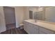 Stylish bathroom featuring a sleek vanity, a shower and a walk-in closet for ample storage at 538 Pender Woods Dr, Summerville, SC 29486