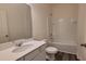 Pristine bathroom with modern vanity, pristine white fixtures, and a shower-tub combo at 538 Pender Woods Dr, Summerville, SC 29486