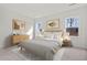 Serene bedroom with natural light, stylish decor, and hardwood floors, creating a relaxing retreat at 542 Pender Woods Dr, Summerville, SC 29486