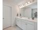Well-lit bathroom featuring a double sink vanity, a large mirror, modern fixtures, and neutral colored flooring at 612 S Pointe Blvd, Summerville, SC 29483