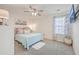 Cozy bedroom with carpet, a ceiling fan, decorative pillows, and a wall-mounted TV, offering a relaxing retreat at 612 S Pointe Blvd, Summerville, SC 29483