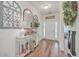 Inviting foyer with decorative console table and elegant hardwood flooring at 612 S Pointe Blvd, Summerville, SC 29483