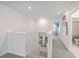 Upstairs hallway leading to bedrooms and bathrooms, featuring grey carpet and recessed lighting at 612 S Pointe Blvd, Summerville, SC 29483