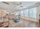 Bright living room featuring hardwood floors and ample natural light at 612 S Pointe Blvd, Summerville, SC 29483