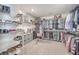 Well-organized walk-in closet with shelving, rods, and ample storage space for clothes, shoes and accessories at 612 S Pointe Blvd, Summerville, SC 29483