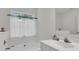 Bright bathroom with tub and vanity with white faucet at 613 Antebellum Ln, Mount Pleasant, SC 29464