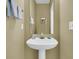 Powder room featuring a pedestal sink and neutral color palette at 613 Antebellum Ln, Mount Pleasant, SC 29464