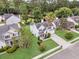 Beautiful two-story home boasting mature trees and a lush green lawn, creating a serene atmosphere at 613 Antebellum Ln, Mount Pleasant, SC 29464