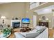 Spacious living room with fireplace, vaulted ceiling, and plenty of natural light at 613 Antebellum Ln, Mount Pleasant, SC 29464