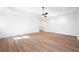 Minimalist bedroom with modern flooring and neutral walls at 6518 Beagle Club Rd, Meggett, SC 29449