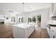 Elegant kitchen featuring a center island, pendant lighting, and stainless-steel appliances at 6518 Beagle Club Rd, Meggett, SC 29449
