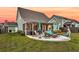 Spacious backyard with a pergola, patio seating, lush lawn, and inviting outdoor space at 658 Yellow Leaf Ln, Summerville, SC 29486