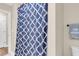 Bathroom featuring a patterned shower curtain, neutral walls, and modern fixtures at 658 Yellow Leaf Ln, Summerville, SC 29486