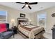 Cozy bedroom with a ceiling fan, natural light, and a warm, inviting atmosphere at 658 Yellow Leaf Ln, Summerville, SC 29486