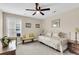 Bright bedroom with natural light, featuring a daybed and warm, inviting decor at 658 Yellow Leaf Ln, Summerville, SC 29486