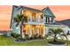 Charming two-story home boasts a spacious second-story balcony and a well-manicured front yard at 658 Yellow Leaf Ln, Summerville, SC 29486