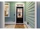 Inviting front door with glass panel and sidelight window at 658 Yellow Leaf Ln, Summerville, SC 29486