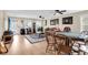 Expansive game room with a poker table, hardwood floors, and plenty of natural light at 658 Yellow Leaf Ln, Summerville, SC 29486