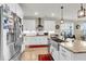 Spacious kitchen showcases white cabinets, stainless steel appliances, and a large island at 658 Yellow Leaf Ln, Summerville, SC 29486