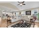 Open-concept living room blends seamlessly with the kitchen, creating a harmonious living space at 658 Yellow Leaf Ln, Summerville, SC 29486