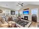 Comfortable living room features fireplace and large windows, creating an inviting atmosphere at 658 Yellow Leaf Ln, Summerville, SC 29486