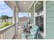 Charming porch with comfortable seating, offering a view of the neighborhood at 658 Yellow Leaf Ln, Summerville, SC 29486