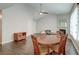Dining room features an open layout, ceiling fan, and hardwood floors at 7955 Timbercreek Ln # 1807, North Charleston, SC 29418