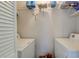 Convenient laundry room with washer, dryer, and ample shelving for storage at 7955 Timbercreek Ln # 1807, North Charleston, SC 29418