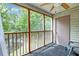 Enclosed porch with a ceiling fan and views of the pond at 7955 Timbercreek Ln # 1807, North Charleston, SC 29418