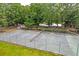 Community tennis court with a fence and greenery, promoting an active lifestyle at 7955 Timbercreek Ln # 1807, North Charleston, SC 29418