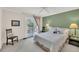 Well-lit bedroom featuring a balcony, and neutral decor for a serene retreat at 8 Town Park Ln # C, Charleston, SC 29412