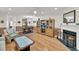 Inviting living space with a cozy fireplace, hardwood flooring, and an open layout at 8 Town Park Ln # C, Charleston, SC 29412