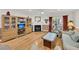 Comfortable living room showcasing a fireplace, built-in shelving, and natural light from a sliding door at 8 Town Park Ln # C, Charleston, SC 29412