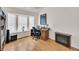 Cozy office space featuring a bay window, wood floors, and an electric fireplace for added comfort at 8 Town Park Ln # C, Charleston, SC 29412