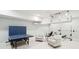 Finished basement with ping pong table and seating area at 80 On The Harbor Dr, Mount Pleasant, SC 29464