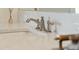 Close up on chrome faucet with marble countertop and undermount sink at 80 On The Harbor Dr, Mount Pleasant, SC 29464