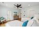 Comfortable bedroom with two twin beds, dresser, access to bathroom, and ceiling fan at 80 On The Harbor Dr, Mount Pleasant, SC 29464