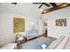 Bedroom showcasing hardwood floors, shiplap walls, and natural light at 80 On The Harbor Dr, Mount Pleasant, SC 29464