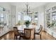 Breakfast nook with bay windows and scenic bridge views at 80 On The Harbor Dr, Mount Pleasant, SC 29464