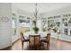 Breakfast nook with bay windows providing natural light and scenic waterfront views at 80 On The Harbor Dr, Mount Pleasant, SC 29464