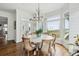 Bright dining area has shiplap walls and a waterfront view at 80 On The Harbor Dr, Mount Pleasant, SC 29464