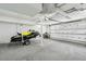 Spacious garage with ample storage and a jet ski at 80 On The Harbor Dr, Mount Pleasant, SC 29464