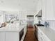 Bright kitchen with central island featuring stainless steel appliances and white countertops at 80 On The Harbor Dr, Mount Pleasant, SC 29464