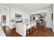 Bright kitchen with a large central island, stainless steel appliances, and open access to the living room at 80 On The Harbor Dr, Mount Pleasant, SC 29464