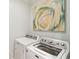 Laundry room with a modern washer and dryer setup at 80 On The Harbor Dr, Mount Pleasant, SC 29464