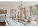 Cozy living room featuring neutral seating, hardwood floors, and natural light at 80 On The Harbor Dr, Mount Pleasant, SC 29464