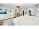 Light-filled main bedroom with hardwood floors, ensuite bathroom and walk-in closet at 80 On The Harbor Dr, Mount Pleasant, SC 29464
