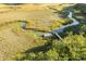 Expansive marshland property featuring a private dock, boat, and waterway access at 853 Whispering Marsh Dr, Charleston, SC 29412
