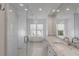 Bright bathroom with marble countertop, dual sinks, modern shower, and freestanding tub at 853 Whispering Marsh Dr, Charleston, SC 29412