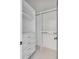 Walk-in closet featuring built-in shelves, drawers, and hanging rods for optimal storage organization at 853 Whispering Marsh Dr, Charleston, SC 29412